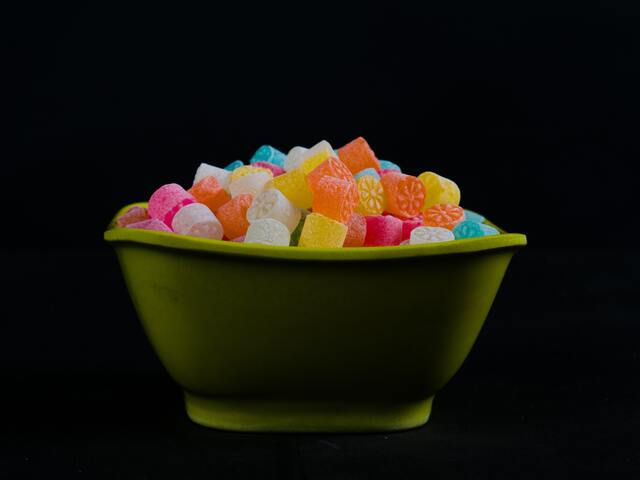 bowl full of candies with various flavors