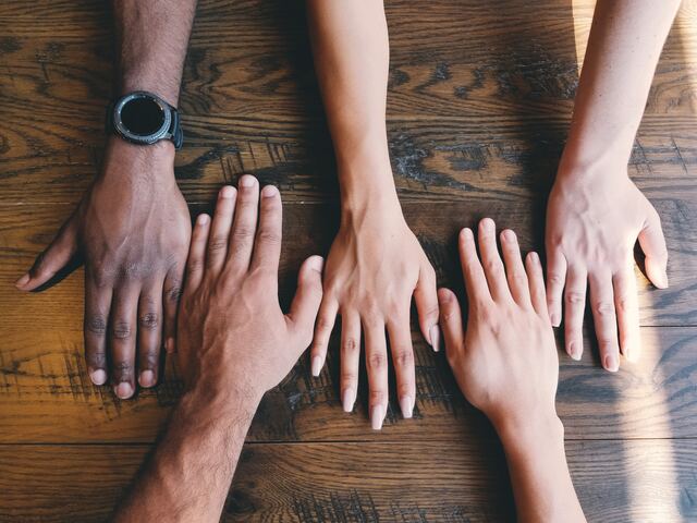 five hands of different color